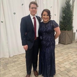 Floor length mother of the bride dress in navy.